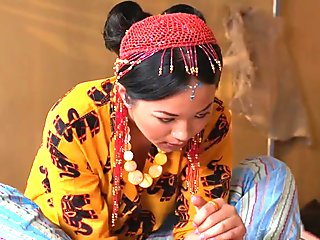 Thai masseuse gives footjob